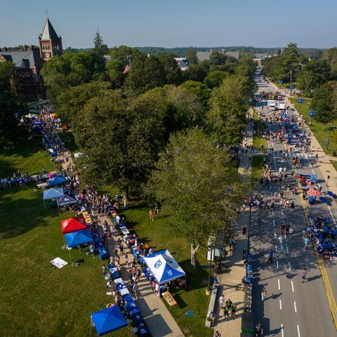 Aerial view of tables set up at UDay on lawn.